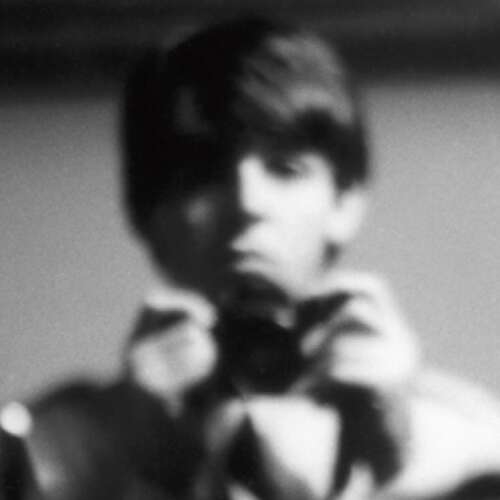 Paul McCartney unscharf in einem Spiegel